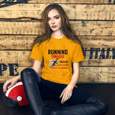 This Running Towards My FEARS T-Shirt features a unique design with bold and vibrant colors that encourages wearers to keep pushing forward, despite their fears. This comfortable, lightweight apparel offers an enjoyable fit and durability that will last through countless runs.